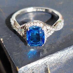 Rhodium Plated Simulated Sapphire Ring - Size 9 - Exquisite Crossover Design